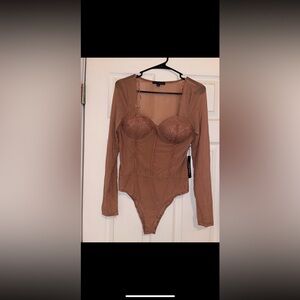 sheer lace bodysuit.